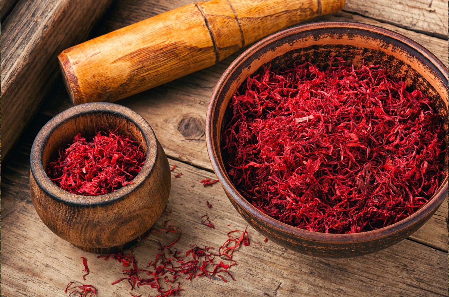 What is Saffron? Everything You Need to Know About this Legendary Spice what is saffron featured image, dried saffron spice in mortar